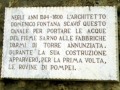 [Plaque by water channel explaining the initial discovery of Pompeii - click to enlarge]