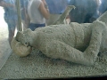 [Plaster cast of a Pompeian in the Macellum  - click to enlarge]